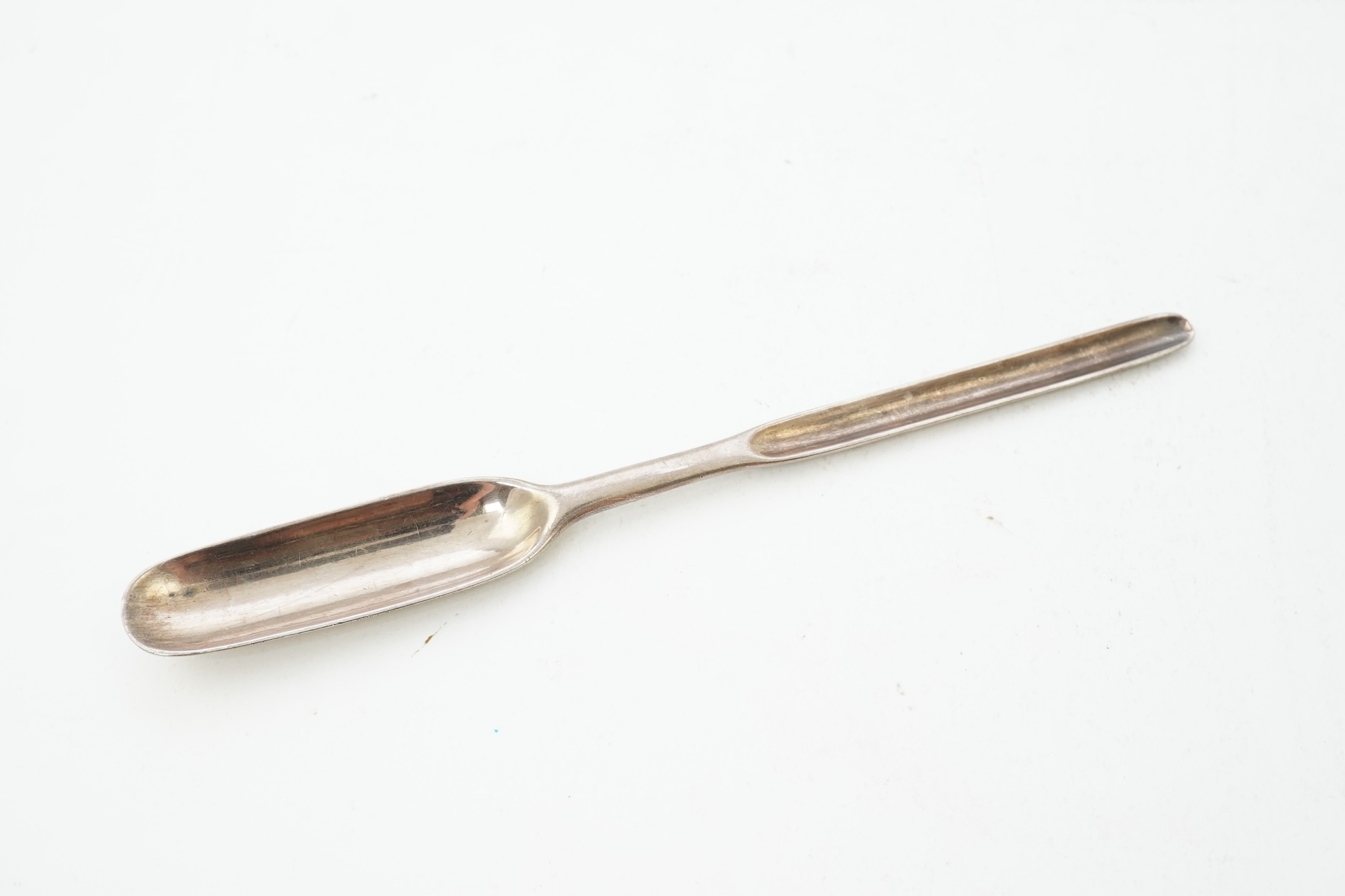 A George I silver marrow scoop, by Paul Hanet